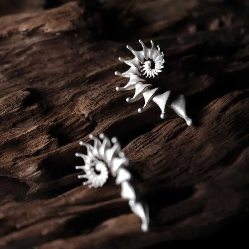 Conch three-dimensional matte stud earrings with exaggerated alloy design and electroplated finish