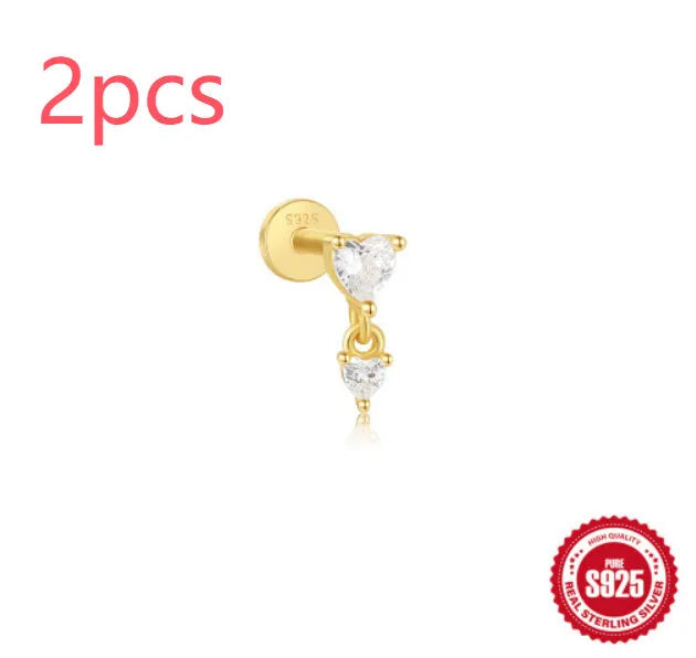 Sterling silver ear stud with a hanging gold-tone tassel charm on a white background.