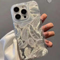 Feather pattern gradient TPU phone case in Silver Gray for iPhone, showing three-dimensional relief texture