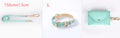 Blue leather dog leash and collar set with metal clip on a plain background
