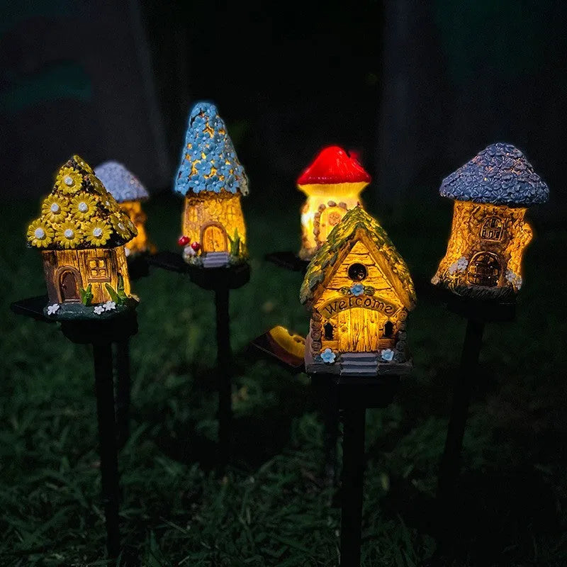 Solar-powered outdoor LED landscape light with flower-shaped resin house design and IP55 waterproof rating