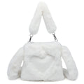 Women's fluffy plush shoulder bag in brown with detachable top handle and shoulder strap on a white background