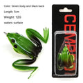 Artificial frog fishing lure with snake head design and double treble hooks in grass green colour