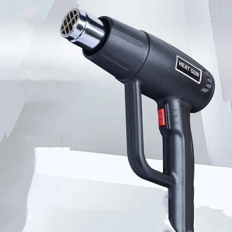 2000W industrial hot air tool with two-speed switch and anti-slip thermal insulation shell.