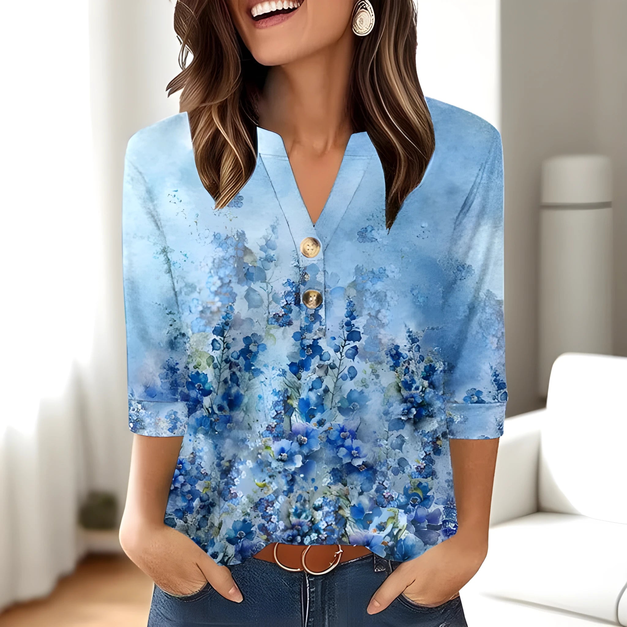Women's loose grey V-neck t-shirt with a colourful 3D geometric pattern on the front.