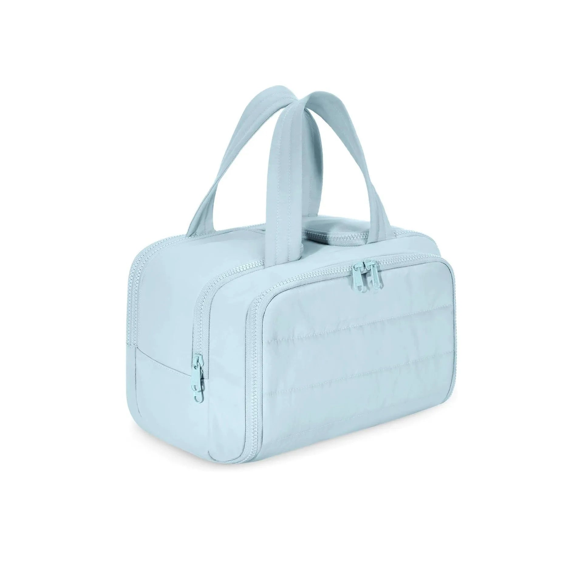 A large, open-topped lightweight travel toiletry bag in a choice of colours, showing its spacious interior.