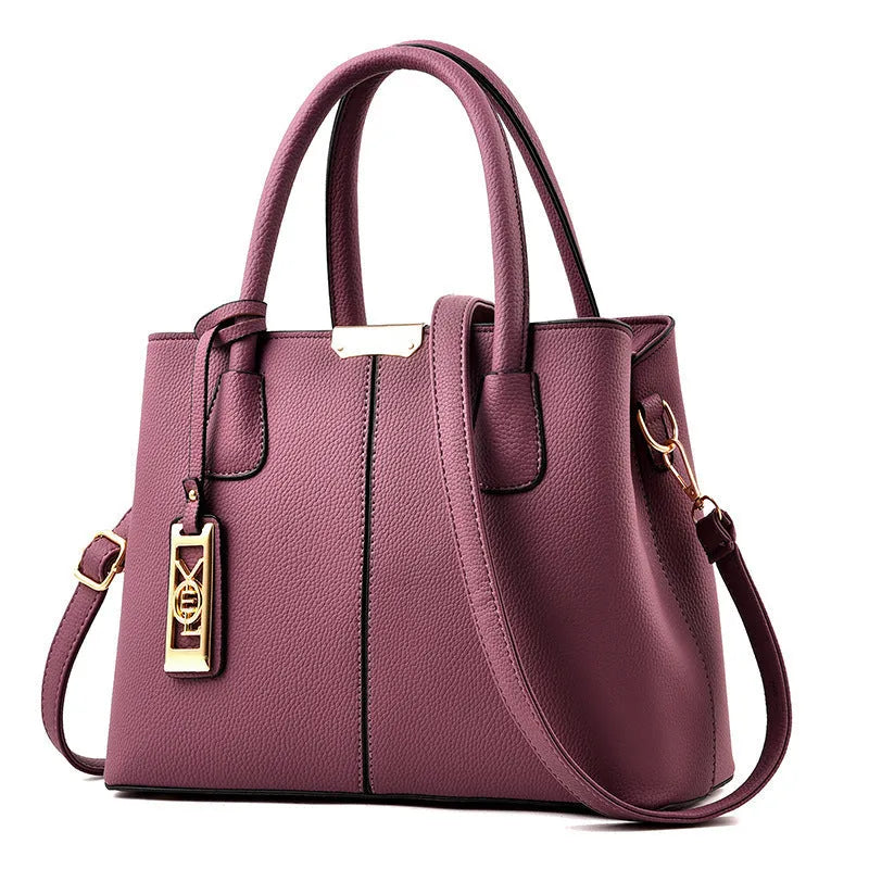 Soft PU leather large capacity shoulder bag for women in a horizontal square shape with an adjustable strap.