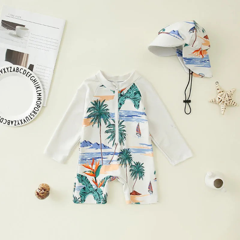 Children's one-piece jumpsuit swimsuit with matching hat in dark blue shark print, made from polyester