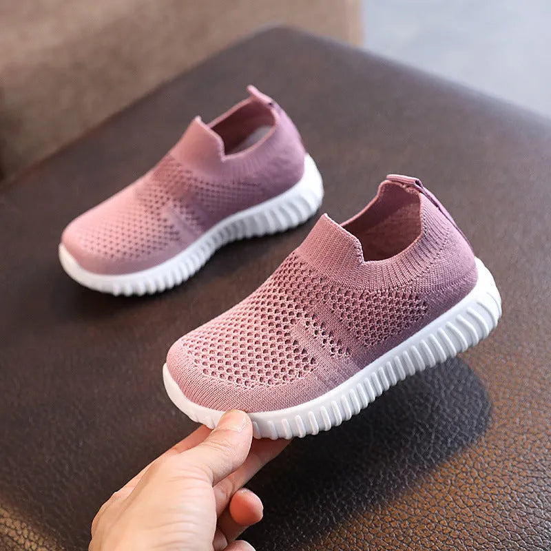 Multicolour knitted fabric toddler sneakers with plastic sole in black, blue, pink, and taro colour options