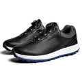 Men's white and black low top golf shoes with breathable design and MD sole