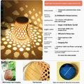 Solar hanging lantern with imitation bamboo woven plastic shade and hollow pattern for outdoor garden lighting