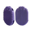 Purple dual-sided pet shampoo brush with soft TPR bristles and ergonomic handle for dog and cat grooming