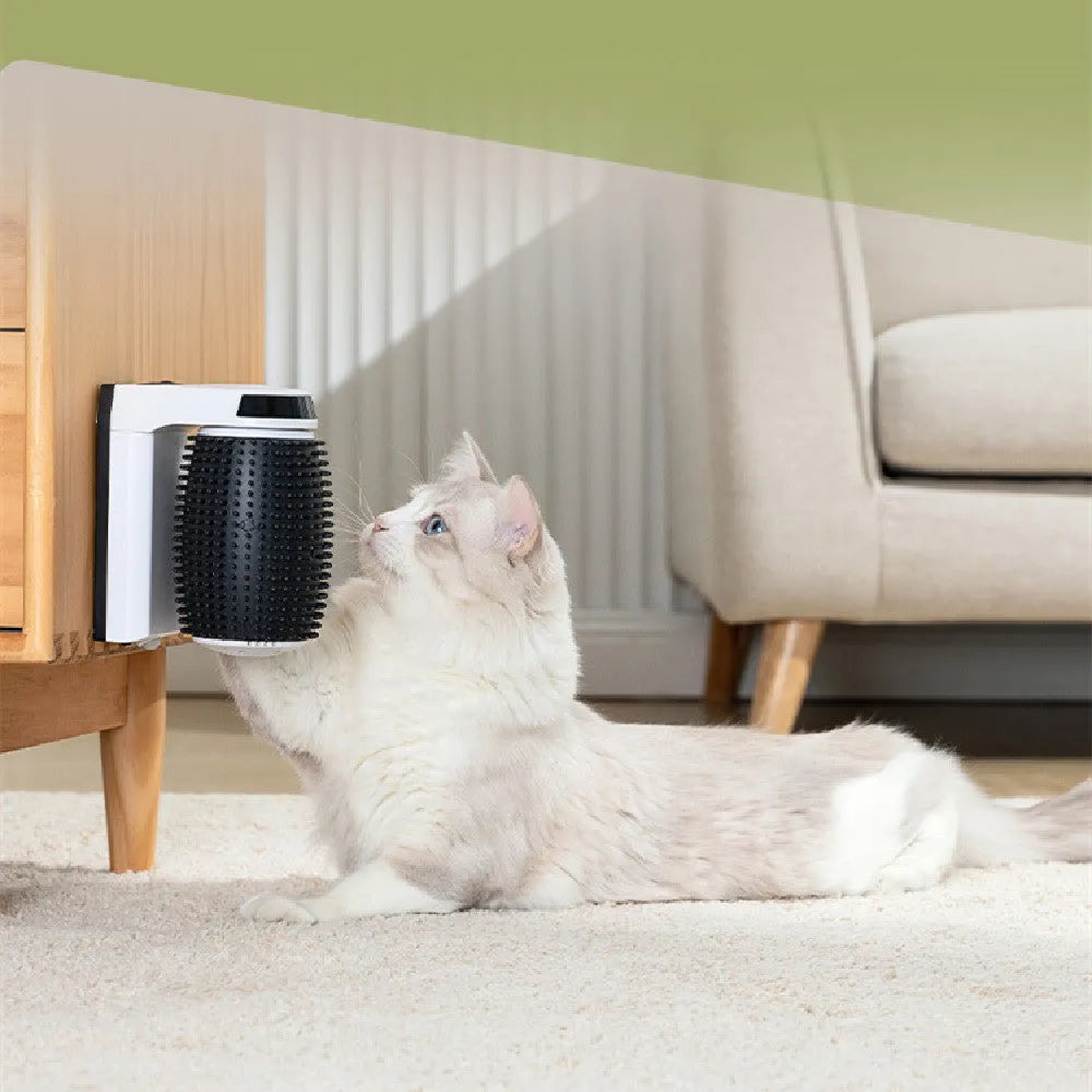 White automatic cat self groomer brush mounted in corner with soft silicone bristles