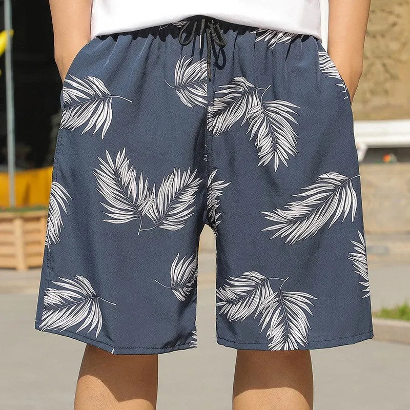 Men's loose fit beach trousers with floral pattern and elastic waistband for summer wear