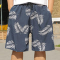 Men's loose fit beach trousers with floral pattern and elastic waistband for summer wear