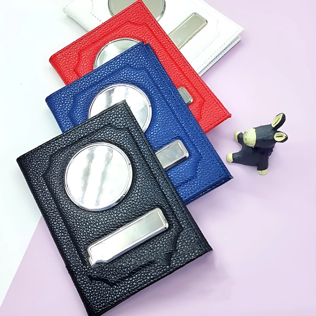 Black synthetic leather passport case with expandable design and aluminum lenses on a plain background