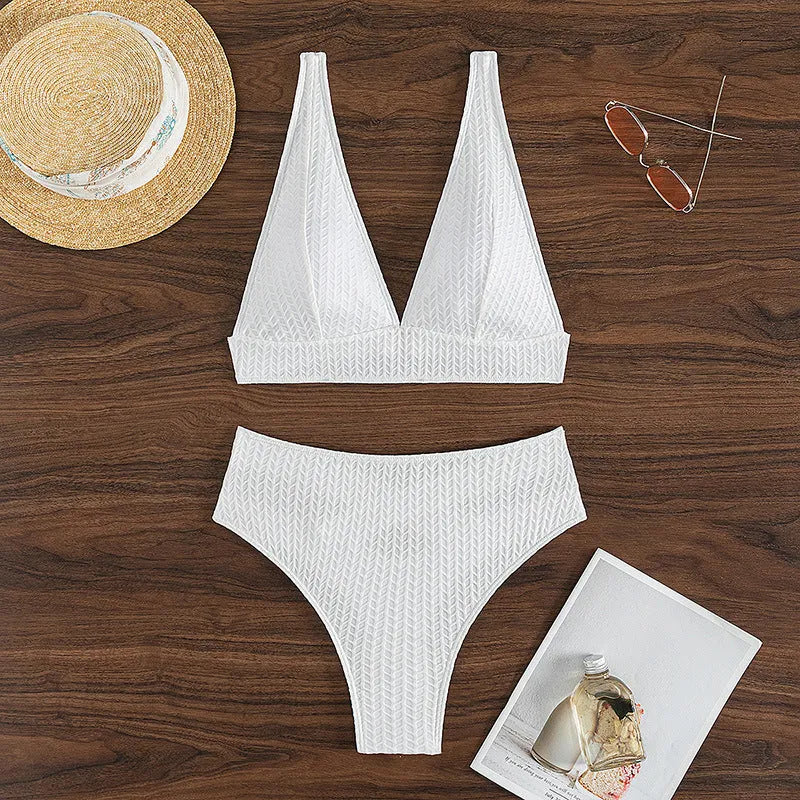 White backless bikini swimsuit set on a mannequin, showing front and back views.