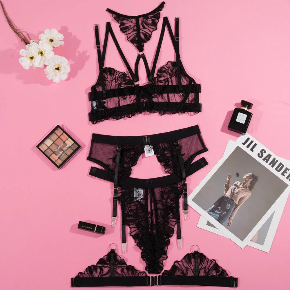 Black women's embroidery mesh bra bikini set with three-point stitching on a polyester fabric.