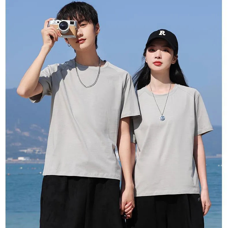 Men's solid colour pure cotton short sleeve T-shirt on a hanger, showing crew neck and straight fit.