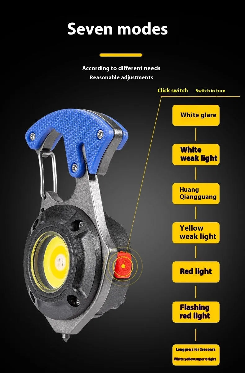 Portable multifunctional keychain flashlight with screwdriver and window breaker hammer, showing COB LED light.