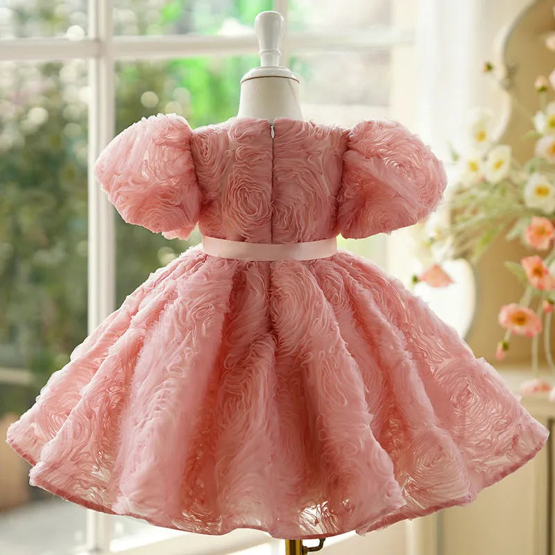 Children's girls birthday pettiskirt in bean pink with layered polyester design, front view