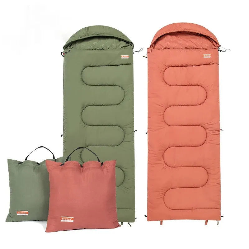 Outdoor camping cotton sleeping bag quilt in ochre or olive green, folded to show portable design.