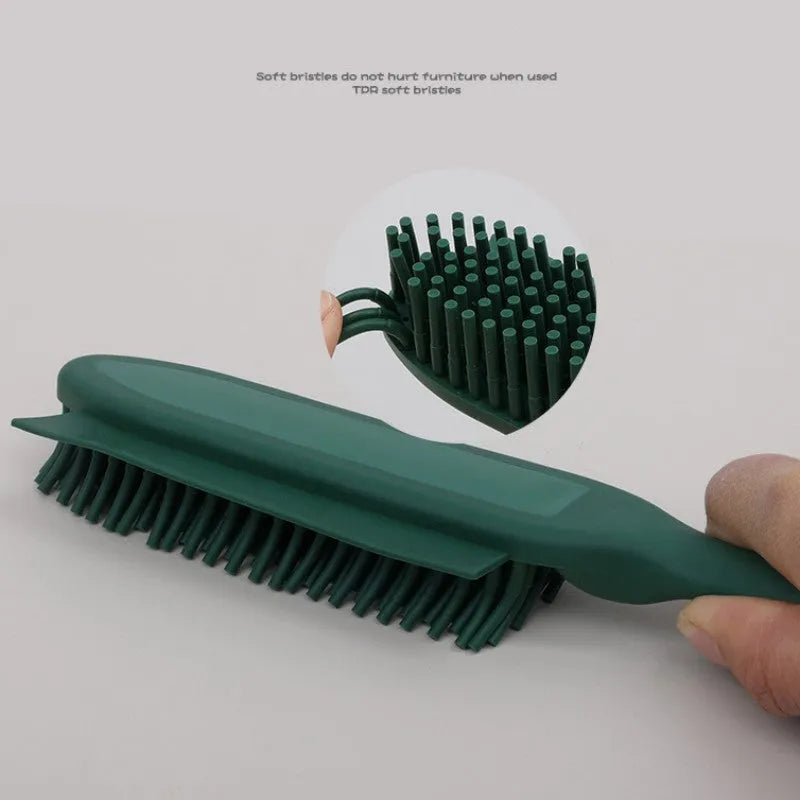 Self-cleaning dog brush pet hair remover in green with integrated hair collector, on white background
