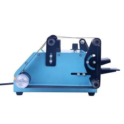 Blue desktop dual-axis belt sander with variable speed switch, shown with a 40mm abrasive belt fitted.