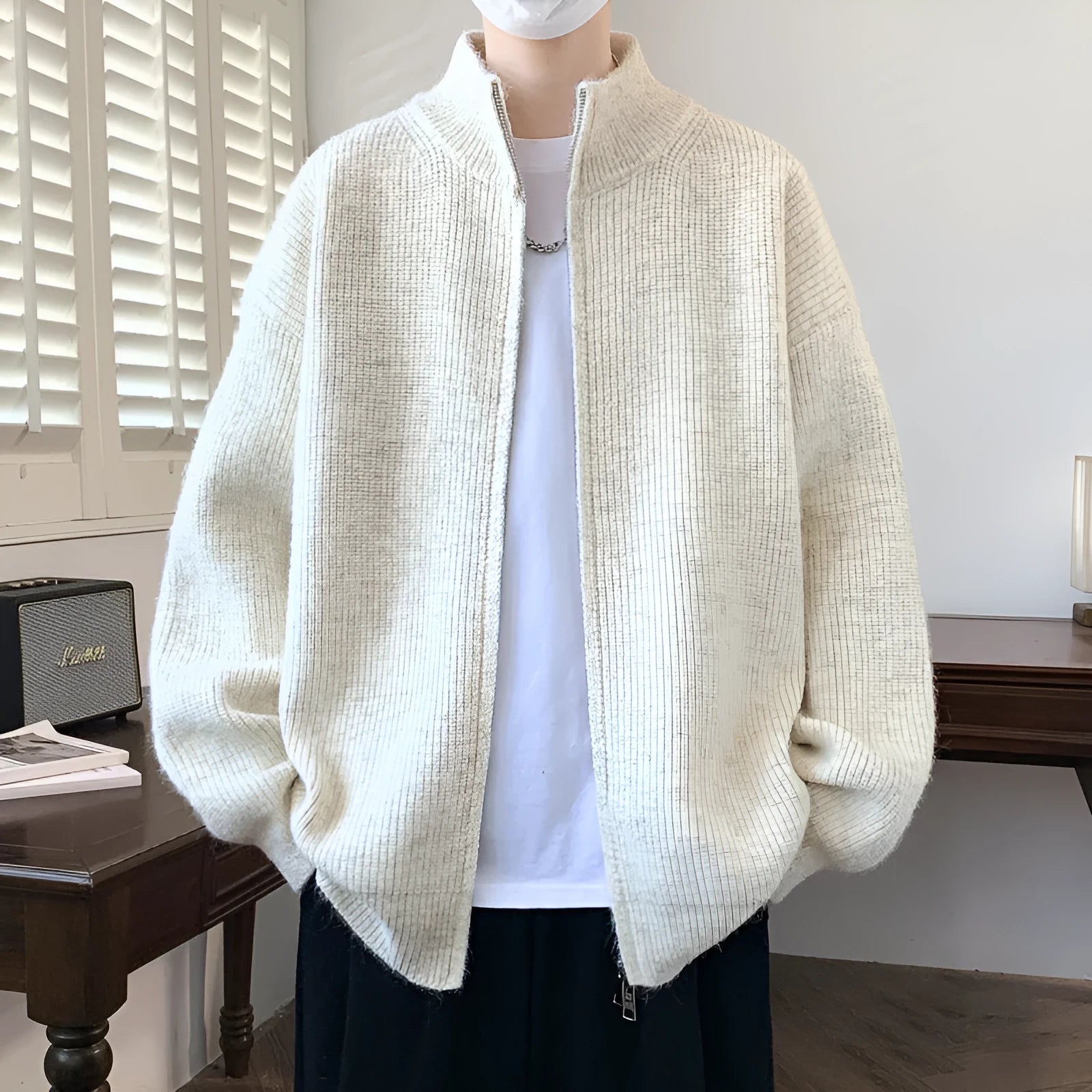 Men's casual stand collar cardigan in Vinylon fabric, beige, loose fit, side view on model