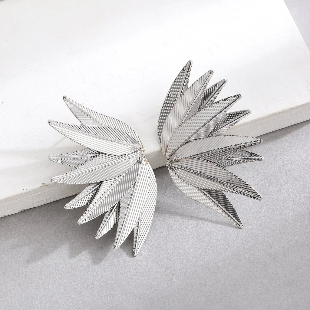 Gold and white alloy patch earrings with leaves shape design