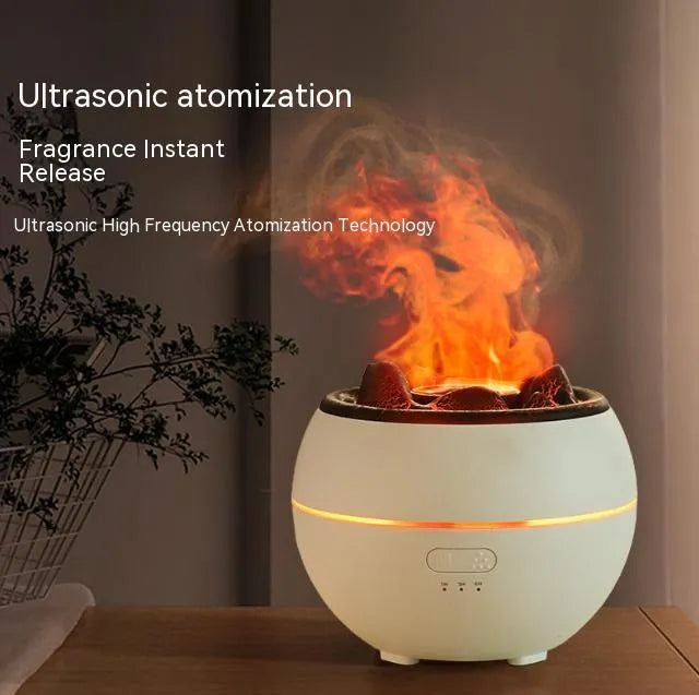 Round white ultrasonic flame aroma diffuser with water tank on desk
