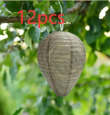 A collapsible paper and wire beehive lantern measuring 22 by 28 centimetres in a photo colour finish.