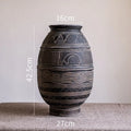 African art cement flower pot with textured finish and drainage holes for indoor outdoor plants