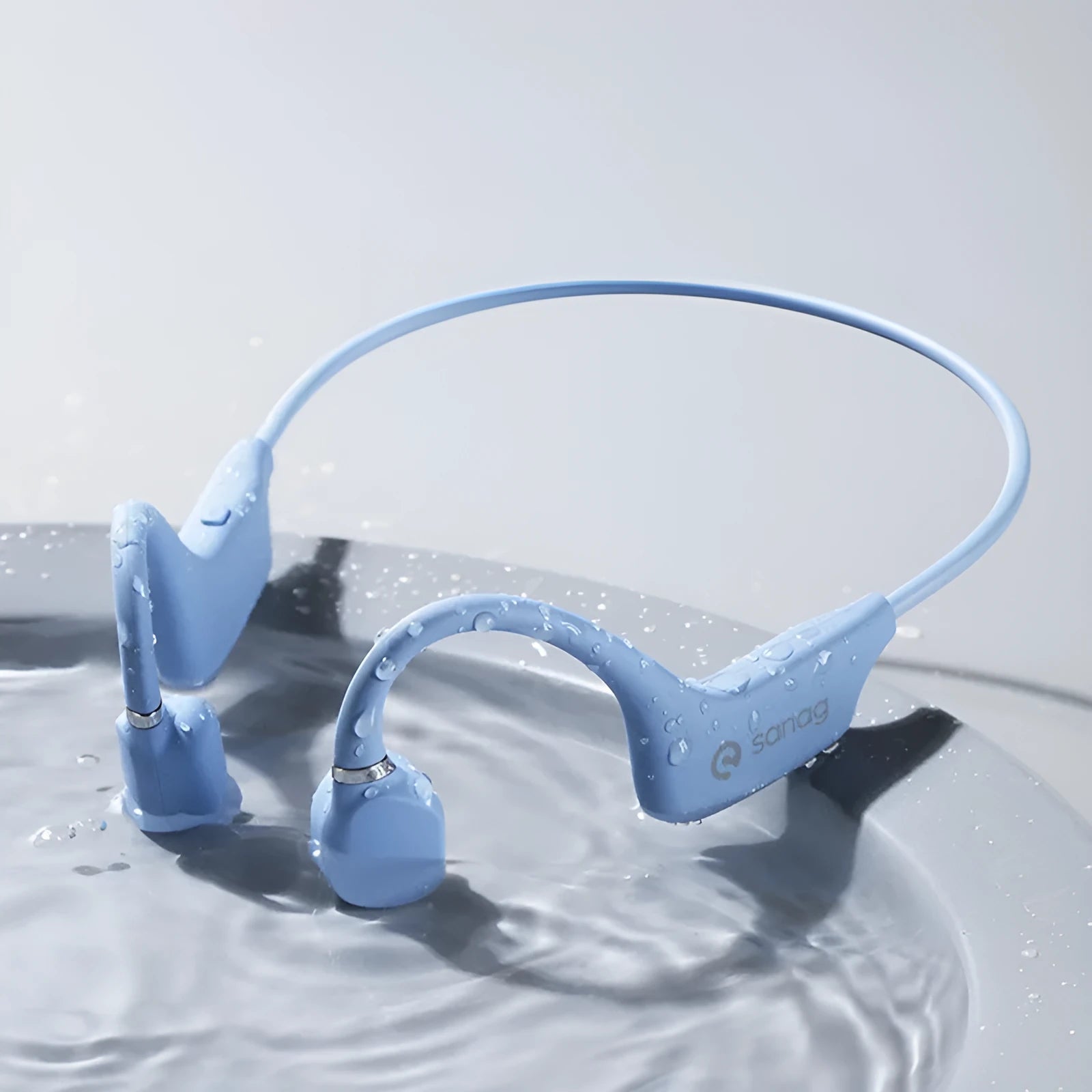 Wireless bone conduction Bluetooth sports headset in a neck-hanging design on a person running.