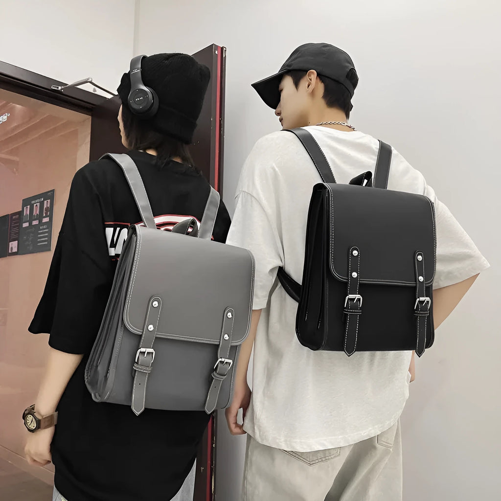 Motorcycle-style PU leather backpack with geometric pattern, buckle, laptop and camera compartments, 20-35L capacity, in black