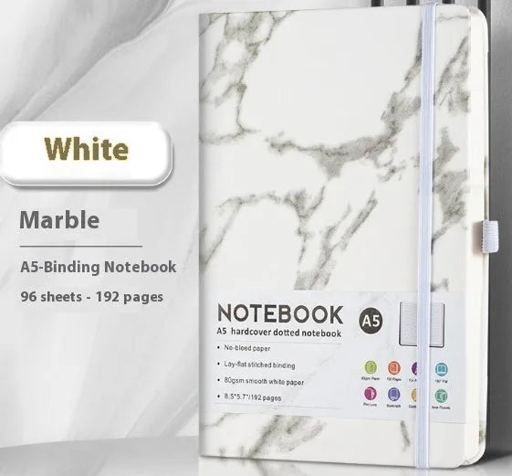 A5 and A6 size notebooks with soft skin-feel PU leather covers and a strap, shown in various colours next to open pages with horizontal ruled lines.
