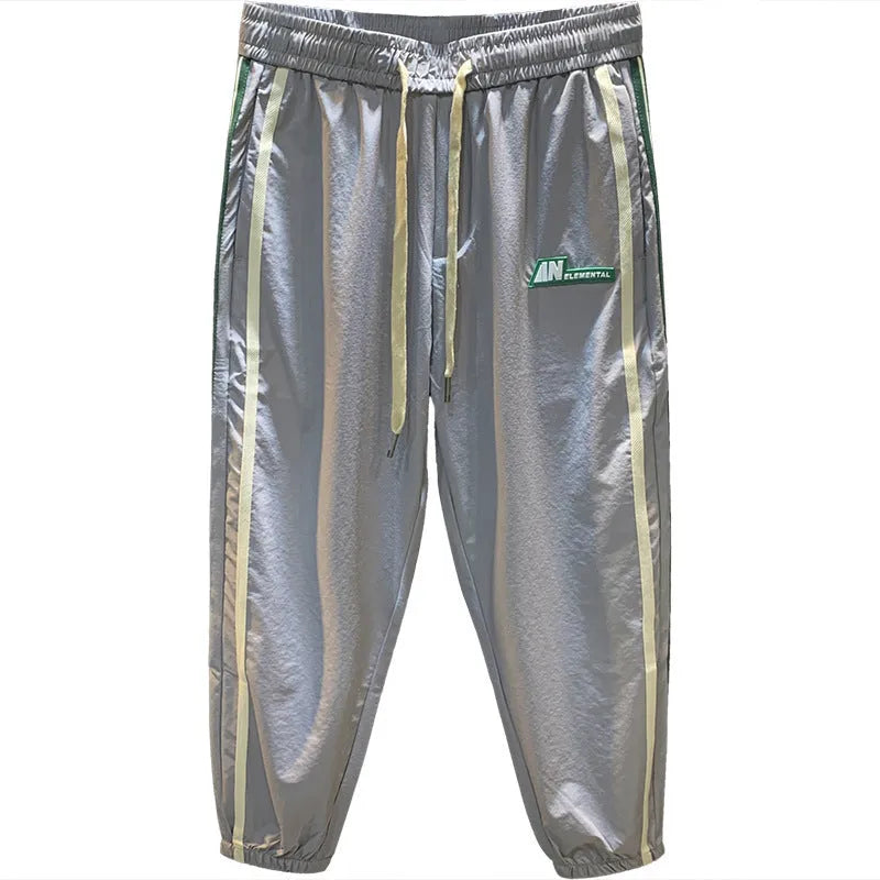 Men's solid colour cotton harem pants in black or grey with mid waist and relaxed fit