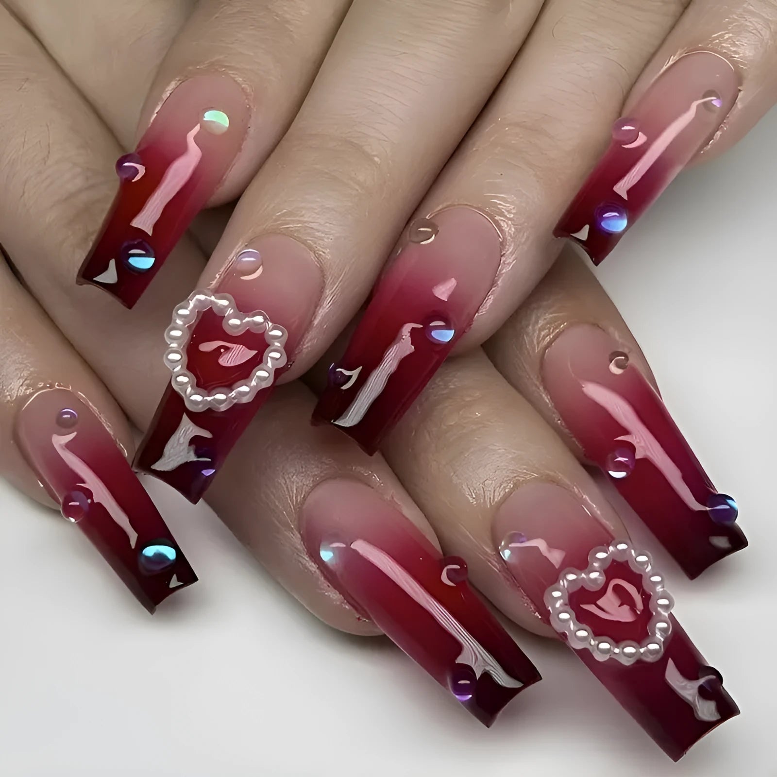 Wine red gradient plaid artificial nail tips with heart and pearl decorative elements in long ballet style