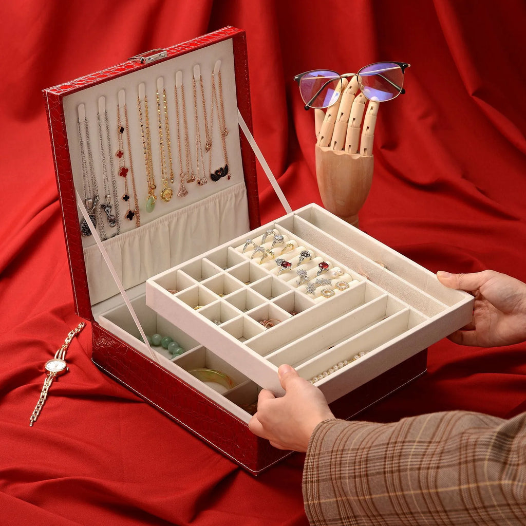 Green crocodile pattern leather double layer wooden jewellery box with lock open, showing storage compartments.