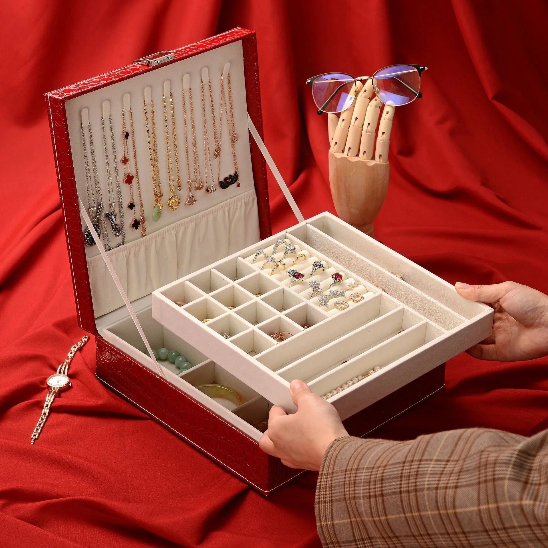 Green crocodile pattern leather double layer wooden jewellery box with lock open, showing storage compartments.