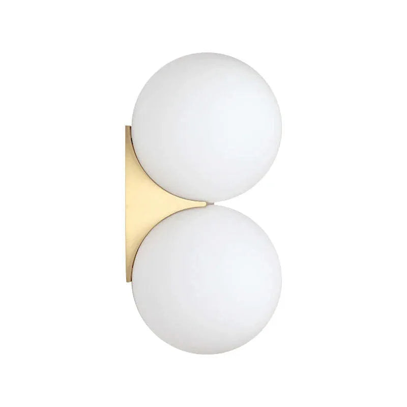 Simple glass ball wall lamp with gold finish and iron frame for bedroom bedside