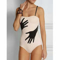 Women's one-piece bikini swimsuit with attached gauze skirt in various sizes
