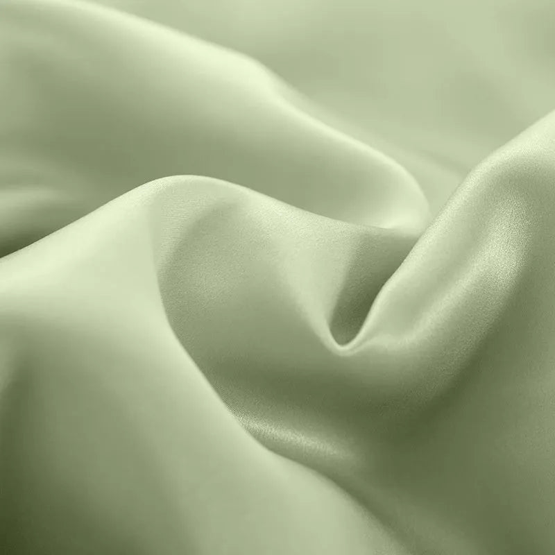 Silk duvet cover in lotus pink showing double-sided construction and plain weave texture