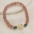 Strawberry quartz bracelet with blue water emerald pendant and Chinese geometric motifs