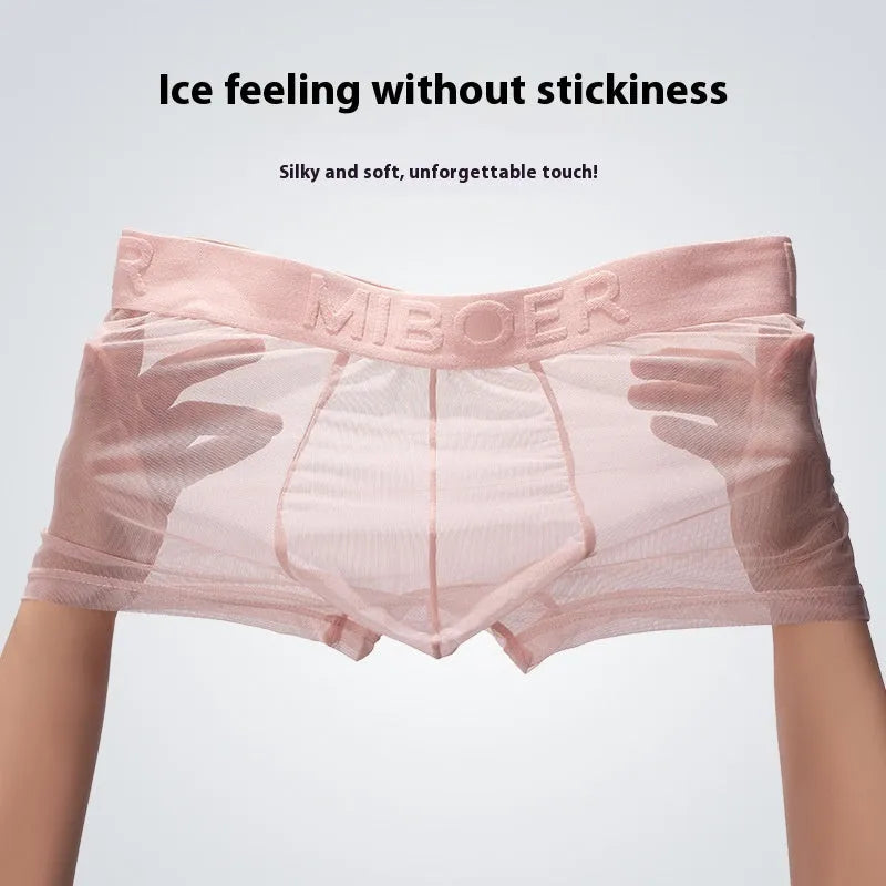 Men's thin polyester boxer shorts in solid colours including black, white, blue, and pink