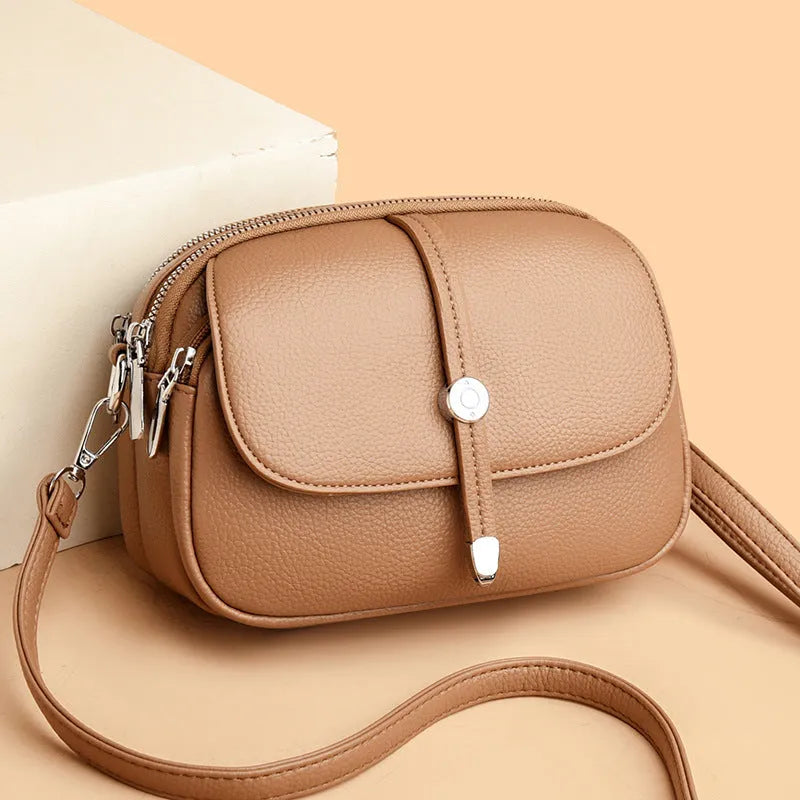 City Simple women's oval crossbody shoulder bag in soft PU leather