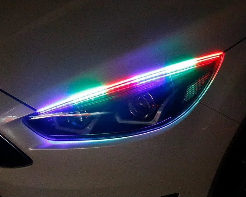 RGB colour-changing LED daytime running light strip with remote control in 30cm, 45cm, and 60cm sizes.