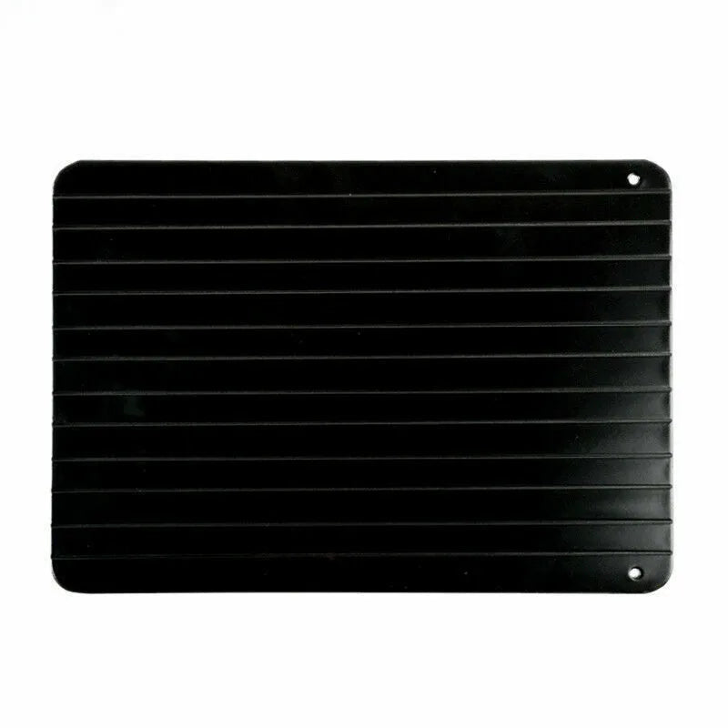Black aluminium fast defrost tray for thawing frozen meat and food without electricity.