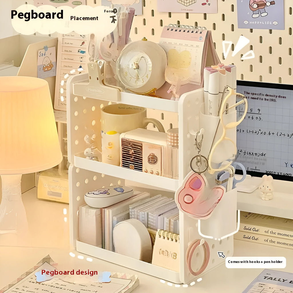 Beige plastic desktop wire-wrap board storage rack with three layers, two pen containers, and six hooks on a desk