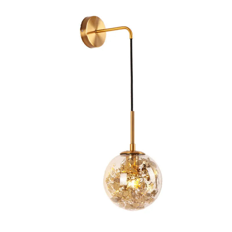 Modern creative wall-mounted bedside lamp with a golden flower glass shade and warm LED light.